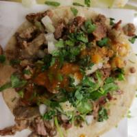 11. Regular Taco · Any meat, onion, cilantro, and salsa.