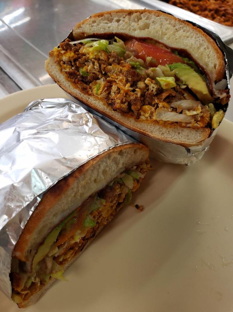 20. Torta Regular · Any meat, toasted Mexican sandwich with cheese, avocado, sour cream, tomatoes, and lettuce.