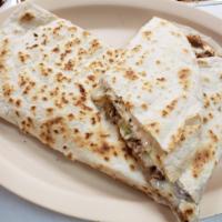 22. Quesadilla El Castillito · A big flour tortilla with melted cheese, any meat, avocado, sour cream, jalapenos, and sauce.
