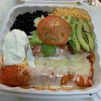 54. Enchiladas · 2 enchiladas with your choice of meat, cheese, and sour cream served with rice, beans, and s...