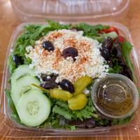 Greek Salad · Feta cheese, tomato, sweet peppers, cucumbers, onions, Kalamata olives and lettuce.