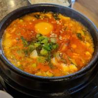 48. Hae Mul Tofu Chi Ghe · Soft tofu stew with assorted seafood (baby shrimp, muscle, squid, claims)
