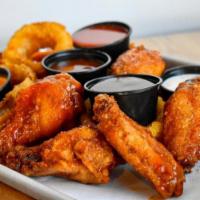 24 Wings · Chicken wings, hormone free, antibiotic free and 100% halal with choice of 3 sauces