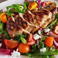 Grilled Chicken Salad · Lettuce, tomatoes, cucumbers, onions, bell peppers, black olives, cheese and chicken breast....