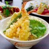 Tempura Donburi · Tempura prawns, white fish, and vegetables served over rice. 