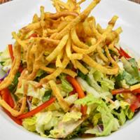 Thai Chicken Salad · Grilled chicken served chilled with julienne red bell peppers, napa cabbage, cilantro, wonto...