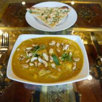 Navratan Shahi Korma · Assorted garden fresh vegetables sauteed in fresh herbs and spices in a cream sauce with cas...