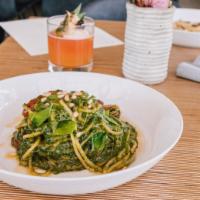 Pesto Spaghetti alla Chitarra. · Spaghetti alla Chitarra, heirloom tomatoes, pine nuts, basil