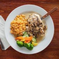 Chicken Piccata · Pan-seared chicken breast, mushrooms, capers, white wine, lemon juice and garlic. Served wit...