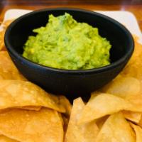 Corn Tortilla Chips with Guacamole · Creamy hand-smashed-in-house-daily guacamole, served with freshly fried in-house tortilla ch...