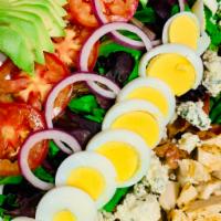 Cobb Salad · Mixed greens, bacon, avocado, blue cheese, onions, tomatoes, hard-boiled eggs and grilled ch...