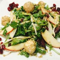 Swick Salad · Baby arugula, Fuji apples, dried cranberries, walnuts and goat cheese covered with pistachio...