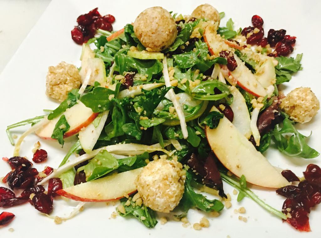 Swick Salad · Baby arugula, Fuji apples, dried cranberries, walnuts and goat cheese covered with pistachios +raspberry vinaigrette