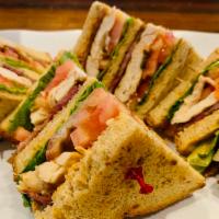 Bacon & Grilled Chicken Club Sandwich · With smoked bacon, lettuce, tomato and chipotle mayonnaise, 12 grain bread