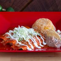 Enchiladas Rojas · Choice of steak, chicken or cheese topped with red chile sauce, lettuce, sour cream and ques...