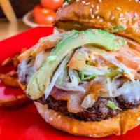Mexican Burger Plato · Juicy 1/2 lbs. burger with sautéed jalapeños and onions, topped with tomato and avocado. For...