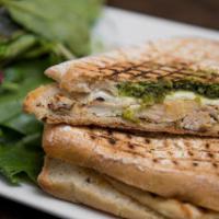 Grilled Free Range Chicken Panini · Grilled free range chicken, homemade mozzarella and basil pesto. Served on ciabatta or bague...