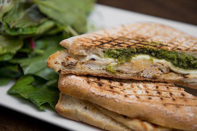 Grilled Free Range Chicken Panini · Grilled free range chicken, homemade mozzarella and basil pesto. Served on ciabatta or baguette with your choice of homemade fries or mixed house greens.