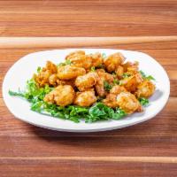 Sweet Heat Shrimp · Crispy shrimp tossed in a sweet and spicy aioli.