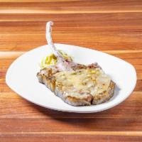 Pork Chop Dinner · Served with apple Normandy sauce and choice of side and soup or salad.
