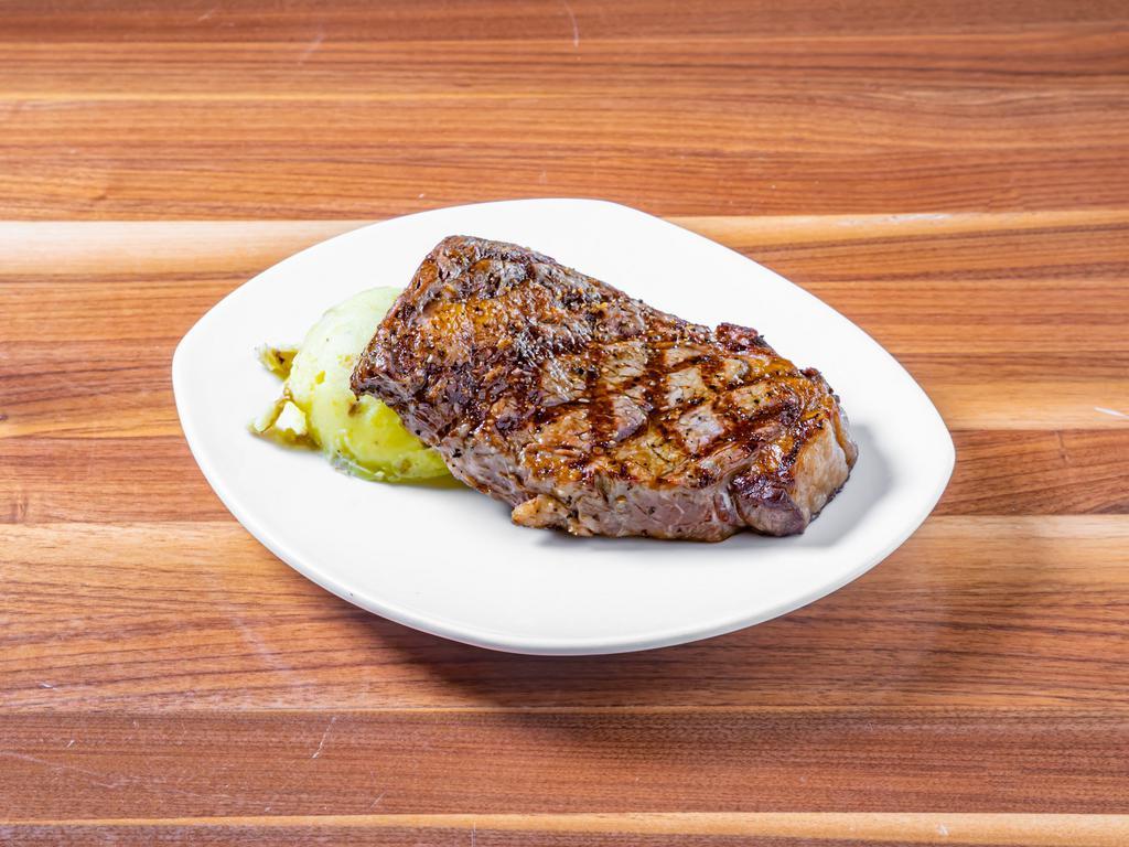 14 oz. Ribeye Butcher Block Dinner    · Served with choice of side and soup or salad.