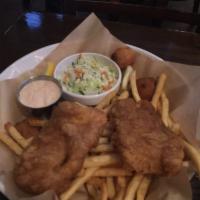 Fish and Chips · Beer batter, house tartar, slaw, fries and hush puppies.