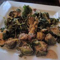 Crispy Brussels Sprouts · Crispy Brussels sprouts with chipotle aioli, cheddar Jack cheese and spiced cashews. Gluten-...