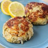 Mini Shrimp and Crab Cakes · Lump crab cakes with Old Bay remoulade over southern slaw. Gluten-free.