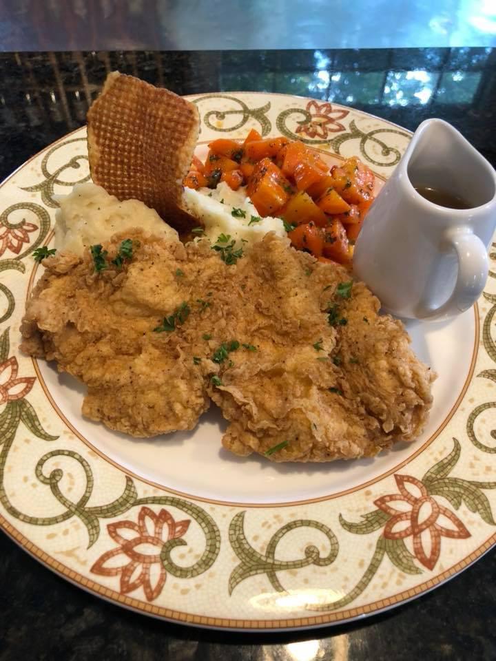 Southern Fried Chicken · Boneless fried chicken breast served with mashed potatoes, gravy and honey citrus glazed carrots. Gluten-free.