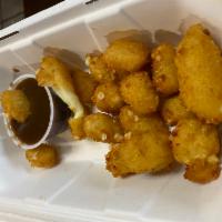 Fried cheese curds  · Lightly breaded Wisconsin cheese curd fry to crispy profession. Served with a dipping sauce ...