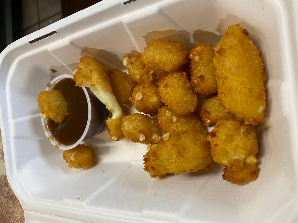 Fried cheese curds  · Lightly breaded Wisconsin cheese curd fry to crispy profession. Served with a dipping sauce on the side.