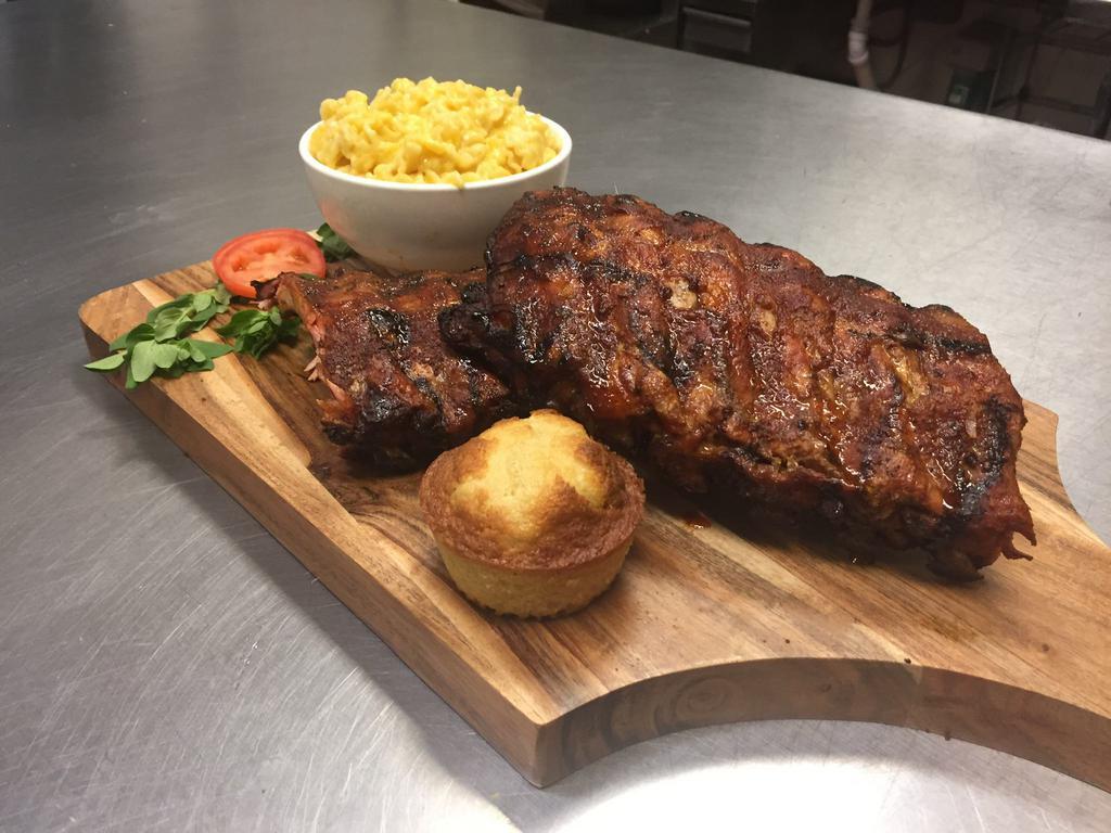 Shack Pack · Full rack of ribs, 1 lb of meat, 4 regular sides, 4 cornbread and a jar of BBQ.