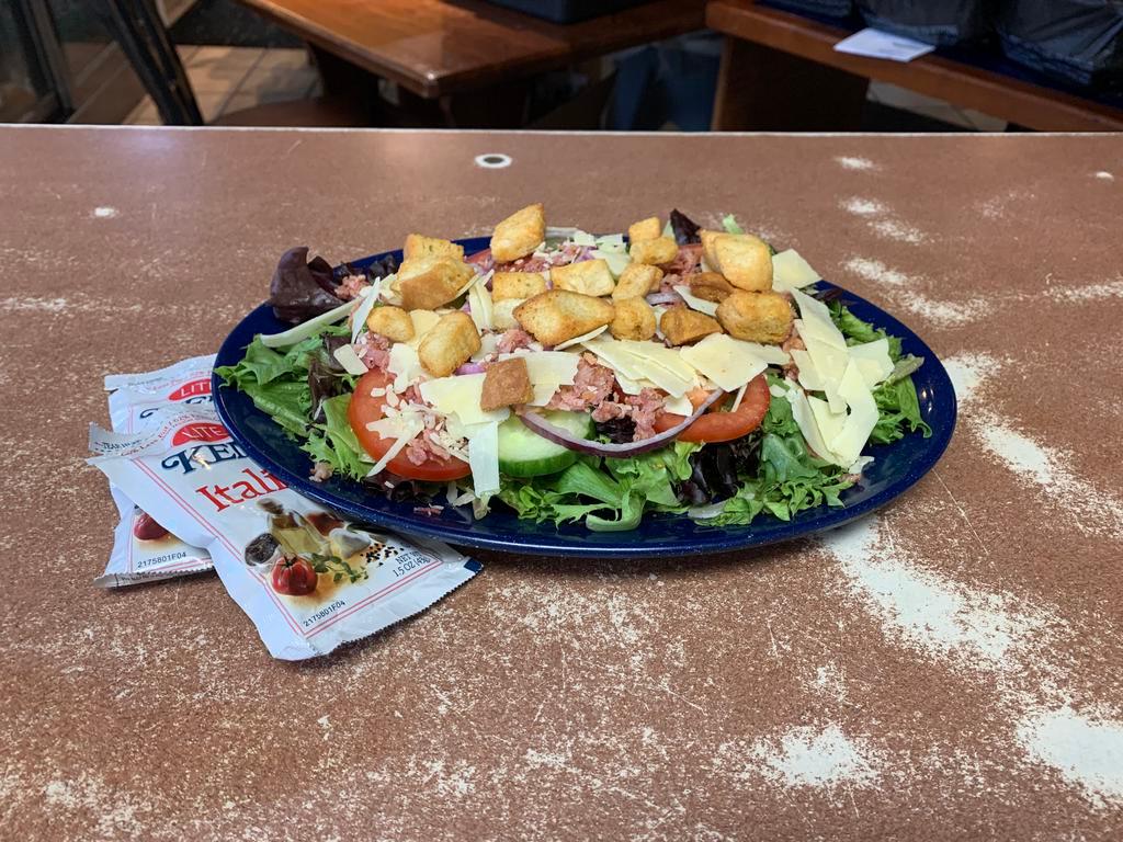 Big Salad · Lettuce, tomato, cucumber, onion, cheese, bacon, croutons and served with your choice of dressing.