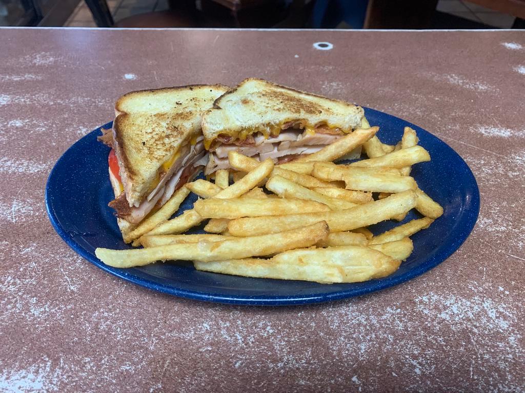 Turkey Bacon Melt (w/ tomato) · Grilled Texas toast, smoked turkey breast, cheddar cheese, tomato, and applewood smoked bacon.