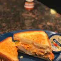 Duke's Buffalo Chicken Sandwich (side blue cheese) · Smoked shredded chicken marinated in wing sauce, topped with ghost pepper jack cheese, lettu...