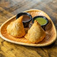 Chicken Samosa · Two pieces.