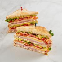 King Club · Double the ham and turkey of McAlister's Club, on country white. Served with choice of side.