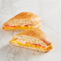 Four Cheese Melt · Provolone, Swiss, Cheddar, Parmesan and fresh tomato slices toasted on ciabatta. Served with...