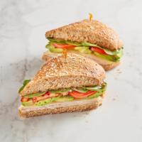 Garden Fresh Turkey Sandwich · Smoked turkey, avocado, spinach, tomato, Swiss, and olive oil & balsamic vinaigrette on 9-gr...