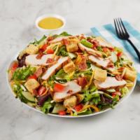 Grilled Chicken Salad · Garden salad with sliced grilled chicken, bacon, cheddar-jack, croutons, tomatoes and cucumb...