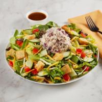 Harvest Chicken Salad · Cheddar-jack, tomatoes, cucumbers and croutons. Contains pecans. Dressing served on the side. 