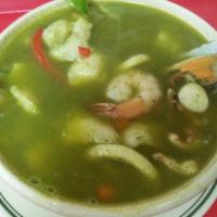 Aguadito de Mariscos · Shrimp, octopus, squid, rice veggies spinach  and cilantro soup