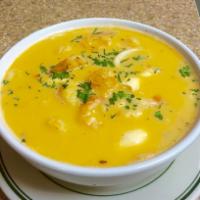 Chupe de Camarones · Shrimp soup with vegetables, rice, cheese, milk and egg
