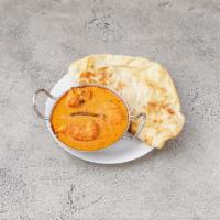 Chicken Tikka Masala with Naan · Boneless cubed chicken marinated in yogurt and spices, cooked in clay oven.