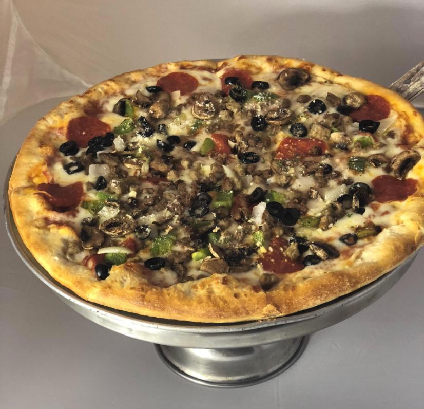Combo Pizza · Cheese, pepperoni, mushrooms, beef, sausage, green peppers, olives, and onions.