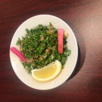 Tabouleh · Fresh parsley, cracked wheat, tomatoes, onions, mixed with olive oil and lemon.