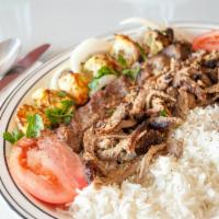 Combination  · Beef shawarma, kefta kabob and chicken kabob. Served with basmati rice and salad.