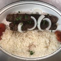 Kafta Kabob  · Grilled mixture of ground beef on skewers. Served with basmati rice and salad.