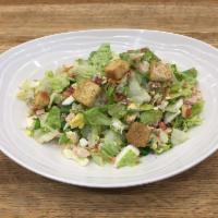 Cobb Chop · Romaine. Tomatoes, Blue Cheese, Hard Boiled Eggs, Croutons. Roasted Turkey, Smokey Bacon. Bl...
