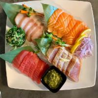 Combo Large Sashimi · 20 pieces of tuna, salmon, yellowtail, albacore. Combo sashimi comes with seaweed salad & fr...